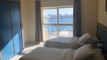 Family Room, Multiple Bedrooms | Minibar, desk, laptop workspace, blackout curtains