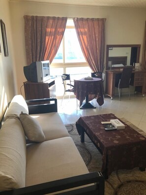 Business-rum - 1 kingsize-säng | Vardagsrum | Tv