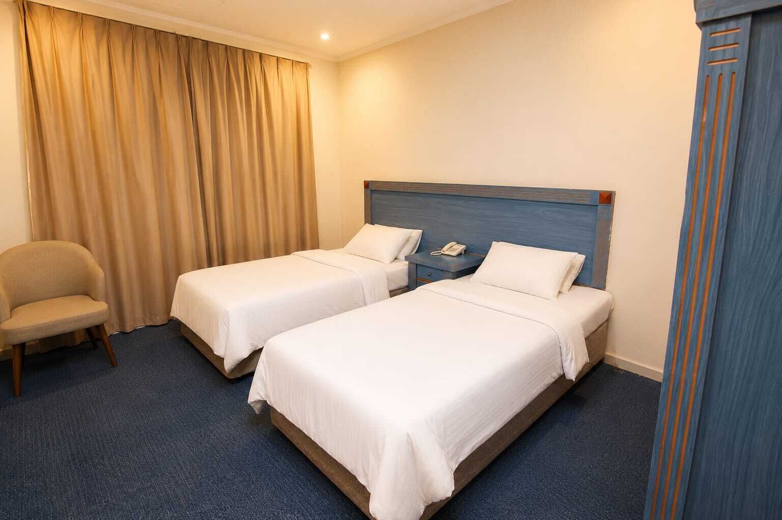 Basic Double Room, 1 Bedroom | Minibar, desk, laptop workspace, blackout drapes
