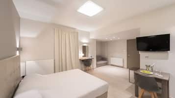 Ropa de cama de alta calidad, minibar, escritorio y cortinas blackout
