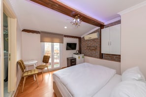 Superior Penthouse, 1 Bedroom, City View | Iron/ironing board, free WiFi, bed sheets - Taksim City Suites (Istanbul)