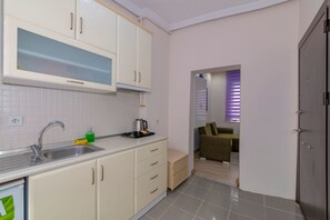 Deluxe Studio, 1 Bedroom | Private kitchen | Fridge, electric kettle - Taksim City Suites (Istanbul)