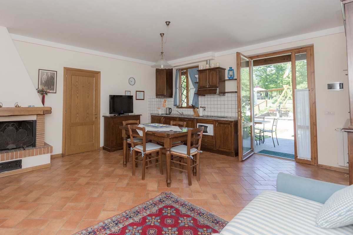 Family Apartment, 1 Bedroom | Living area | Flat-screen TV