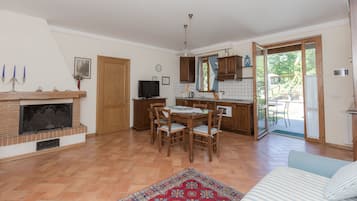 Family Apartment, 1 Bedroom | Living area | Flat-screen TV