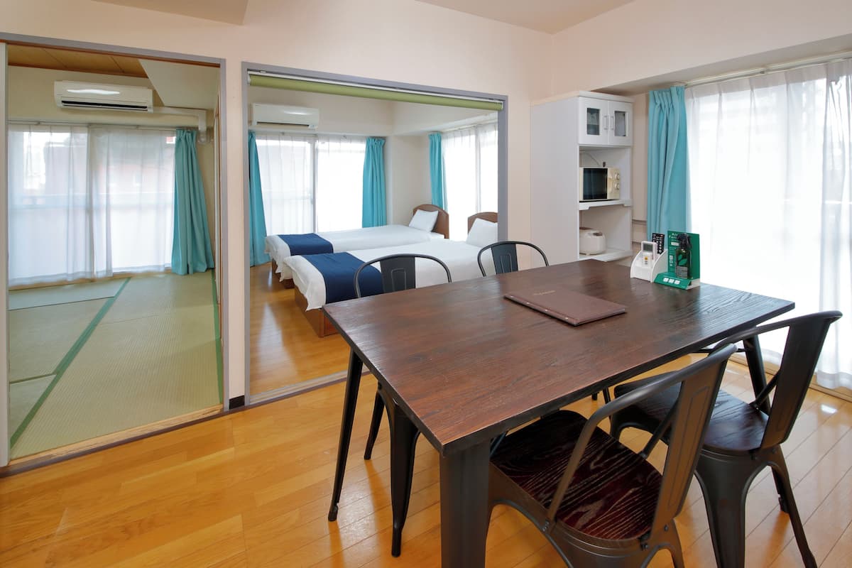Family Apartment, Non Smoking | 1 bedroom, desk, laptop workspace, free WiFi