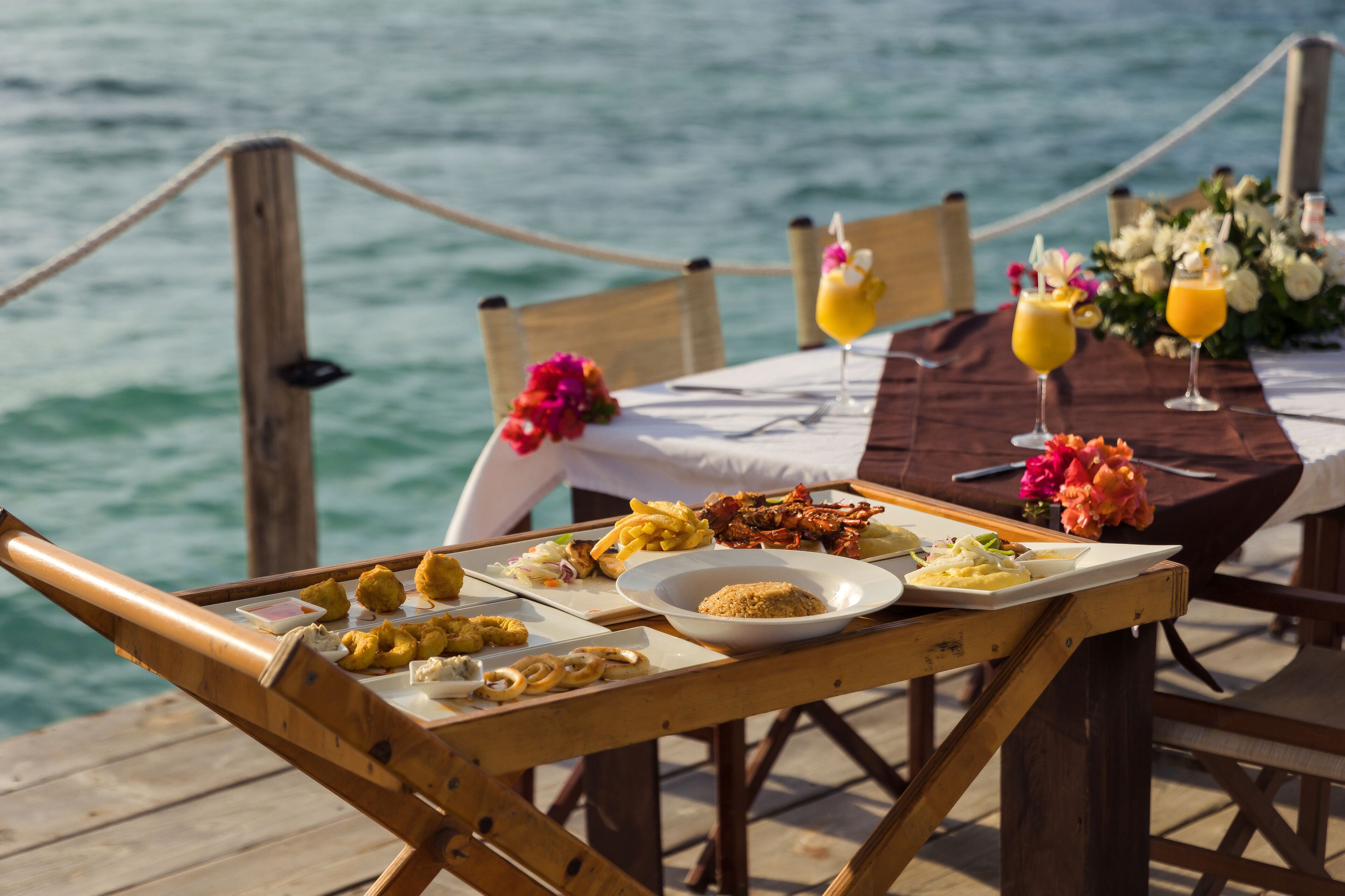 lunch, dinner served; local and international cuisine, beach views