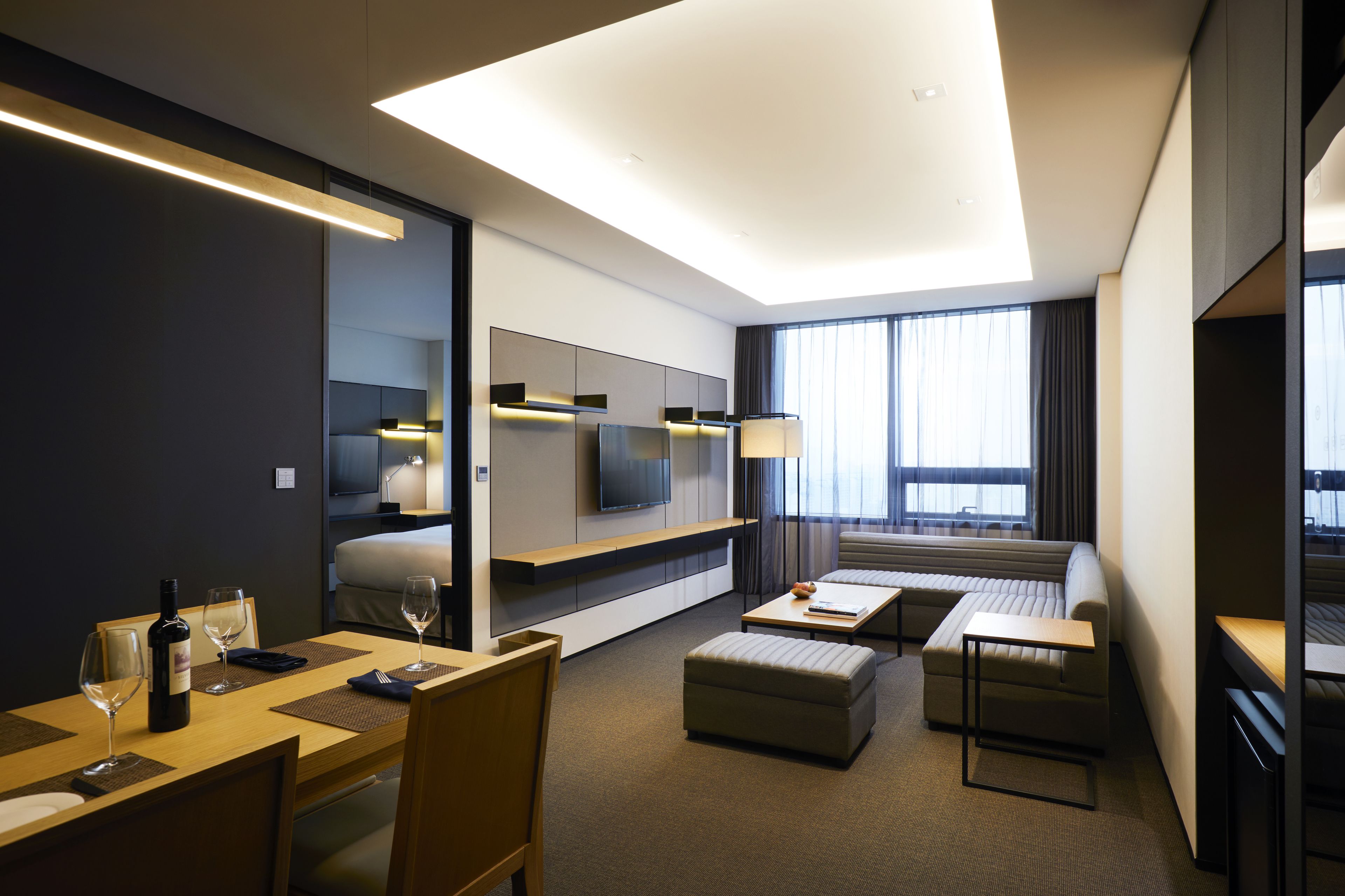 glad house | living area | flat-screen tv