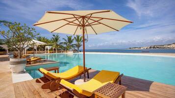 2 outdoor pools, pool umbrellas, sun loungers