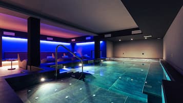 Indoor pool, open 2:00 PM to 8:00 PM, pool loungers