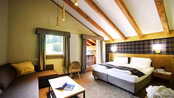 Premium bedding, down duvets, memory-foam beds, in-room safe