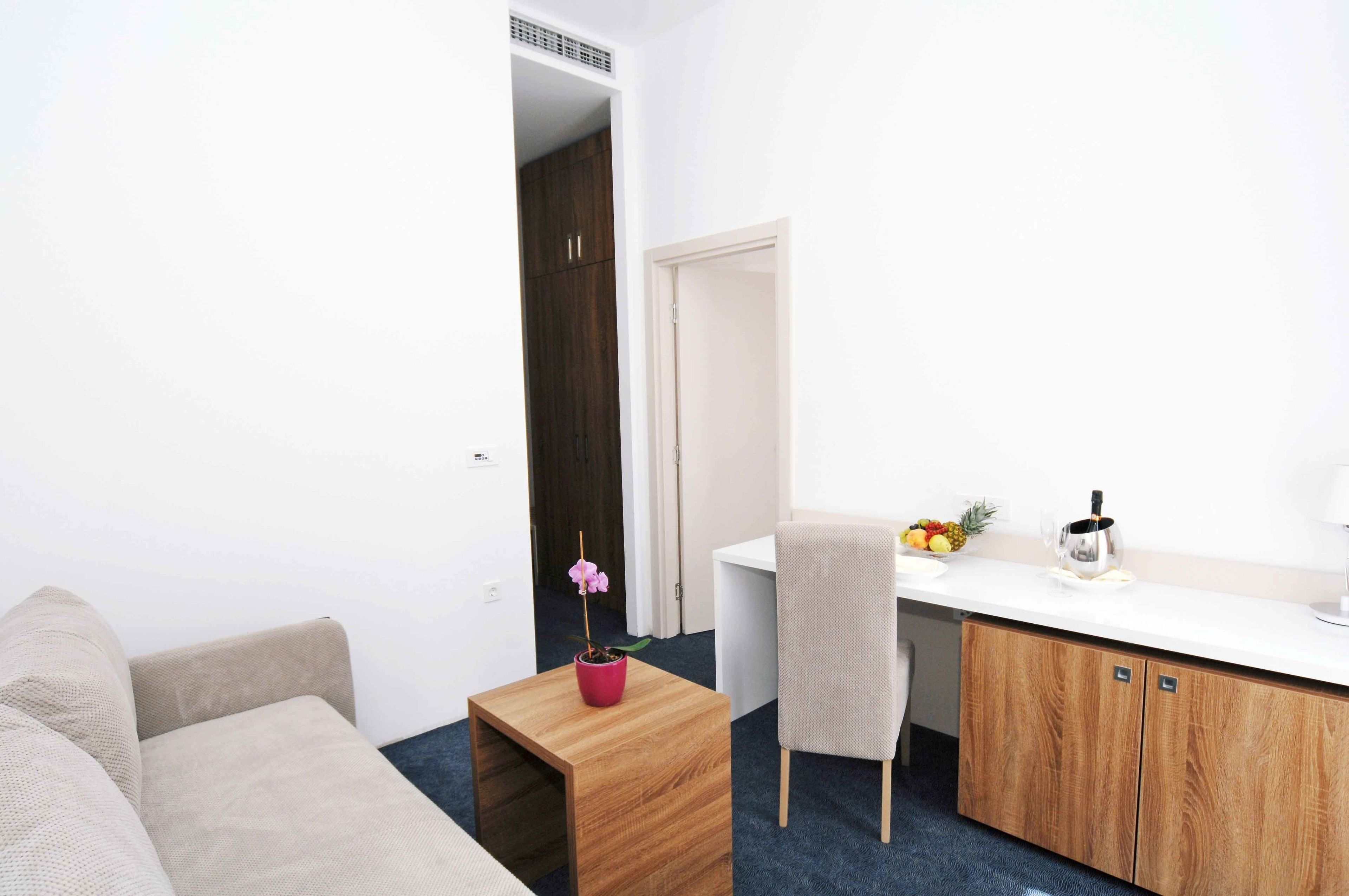 apartment, sea view | living area | flat-screen tv