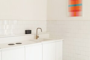 Comfort Apartment, 2 Bedrooms, Balcony, City View | Private kitchen | Full-size fridge, espresso maker, coffee/tea maker, electric kettle - Spacebility Airport-  self check-in (Cagliari)