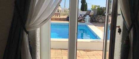 Twin Room, Pool View | Iron/ironing board, bed sheets