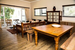 Exclusive Cottage, 3 Bedrooms | Living area | Flat-screen TV