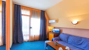 Family Room, Balcony, Sea View | Minibar, desk, free WiFi