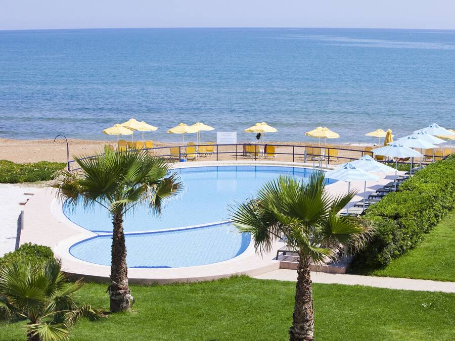 Outdoor pool, an infinity pool, open 8:00 AM to 8:00 PM, pool umbrellas