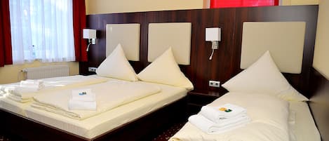 Triple Room | Premium bedding, minibar, desk, blackout curtains