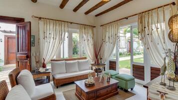 Superior Villa, 3 Bedrooms, Beach View | Living room | Flat-screen TV