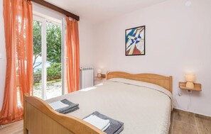 2 dormitorios, tabla de planchar con plancha, wifi gratis y ropa de cama