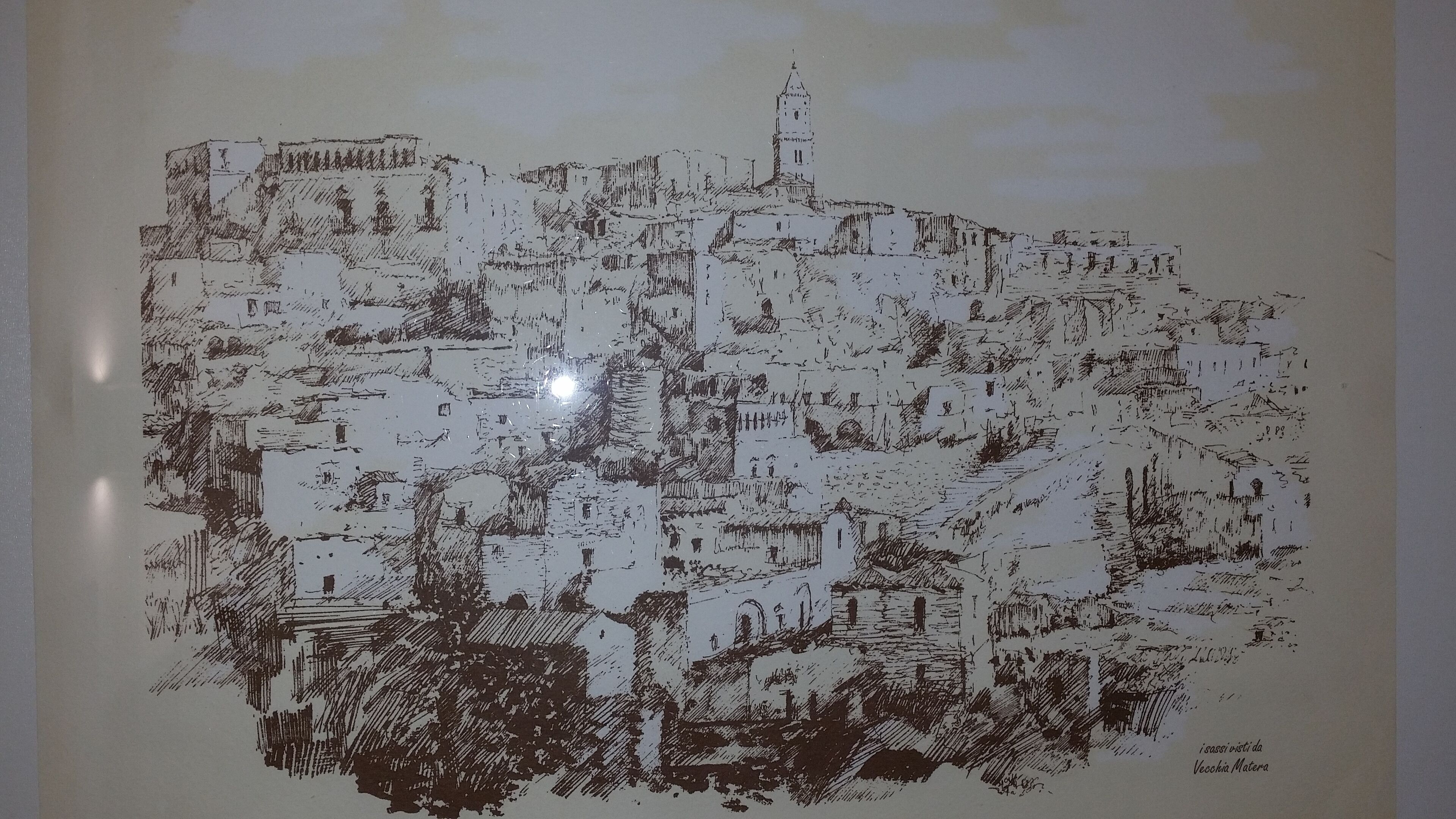 Un dibujo detallado de un pueblo histórico con diversos edificios y una torre destacada.