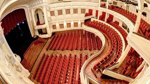 A theater with a curved seating arrangement and multiple balconies. - The Berry Vinhomes Luxury Apartments (Ho Chi Minh City)