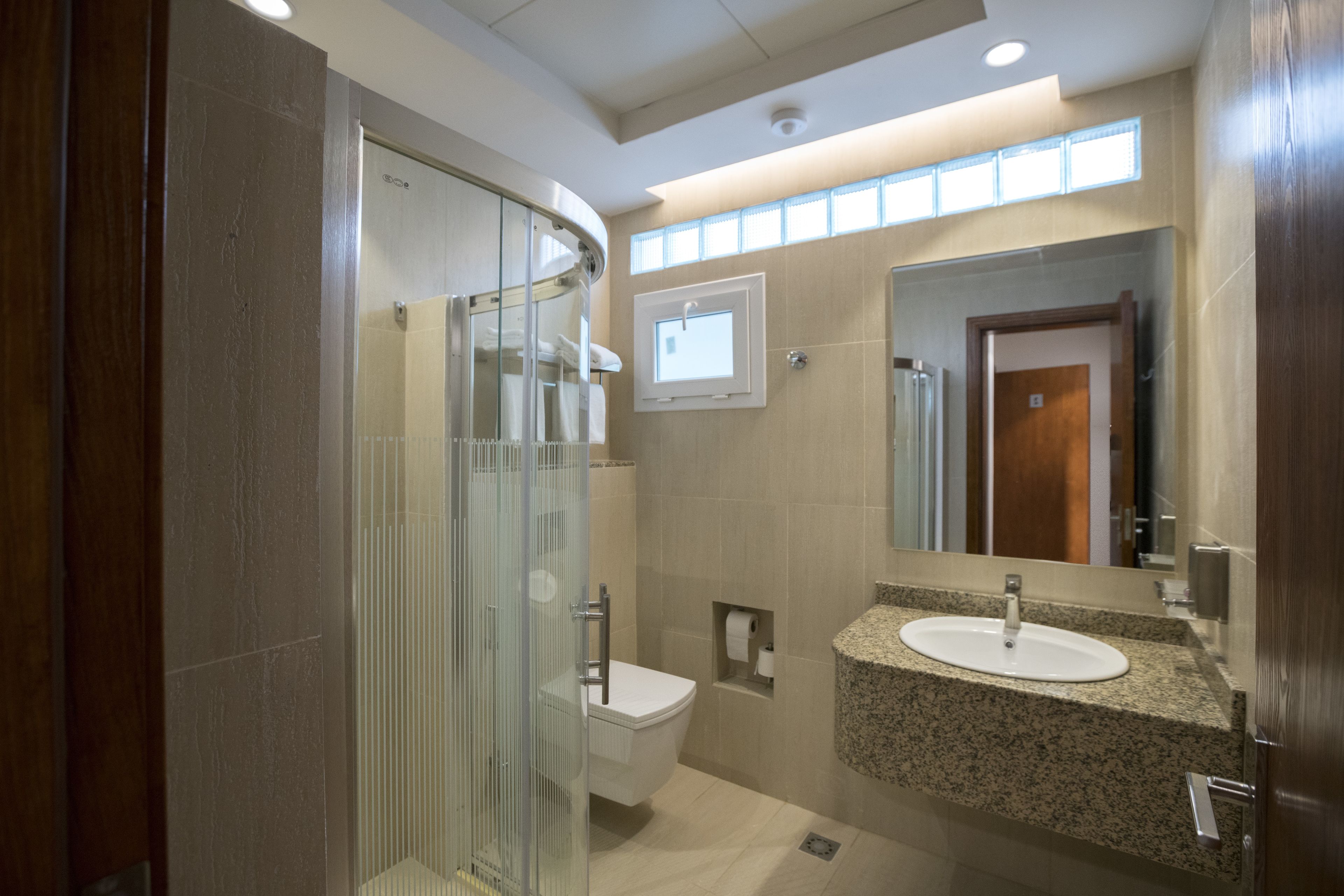 Shower, free toiletries, hair dryer, towels