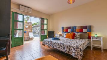 Driepersoonskamer, patio, tuin | Verduisterende gordijnen, gratis wifi, beddengoed
