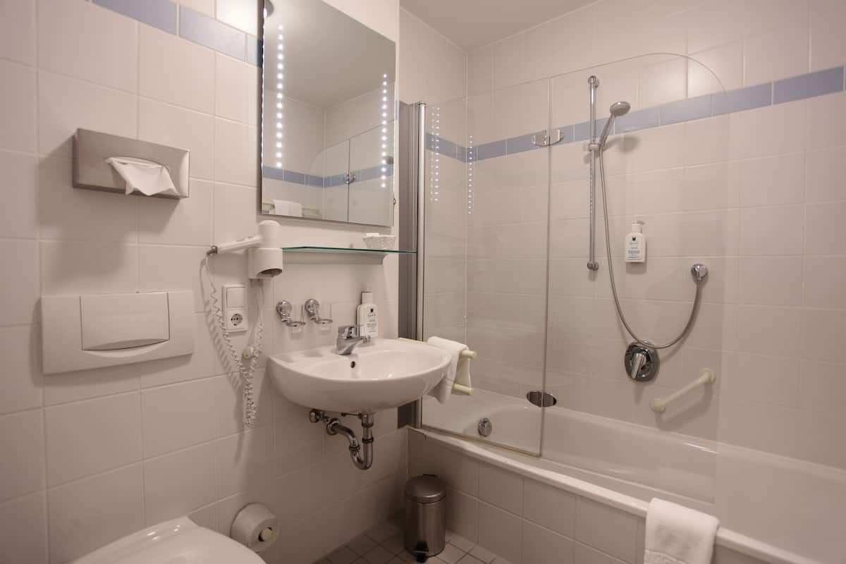 standard apartment | bathroom | free toiletries, hair dryer, bathrobes, slippers