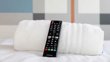 Quarto duplo básico, 2 camas de solteiro, sem janelas | Comodidades do quarto