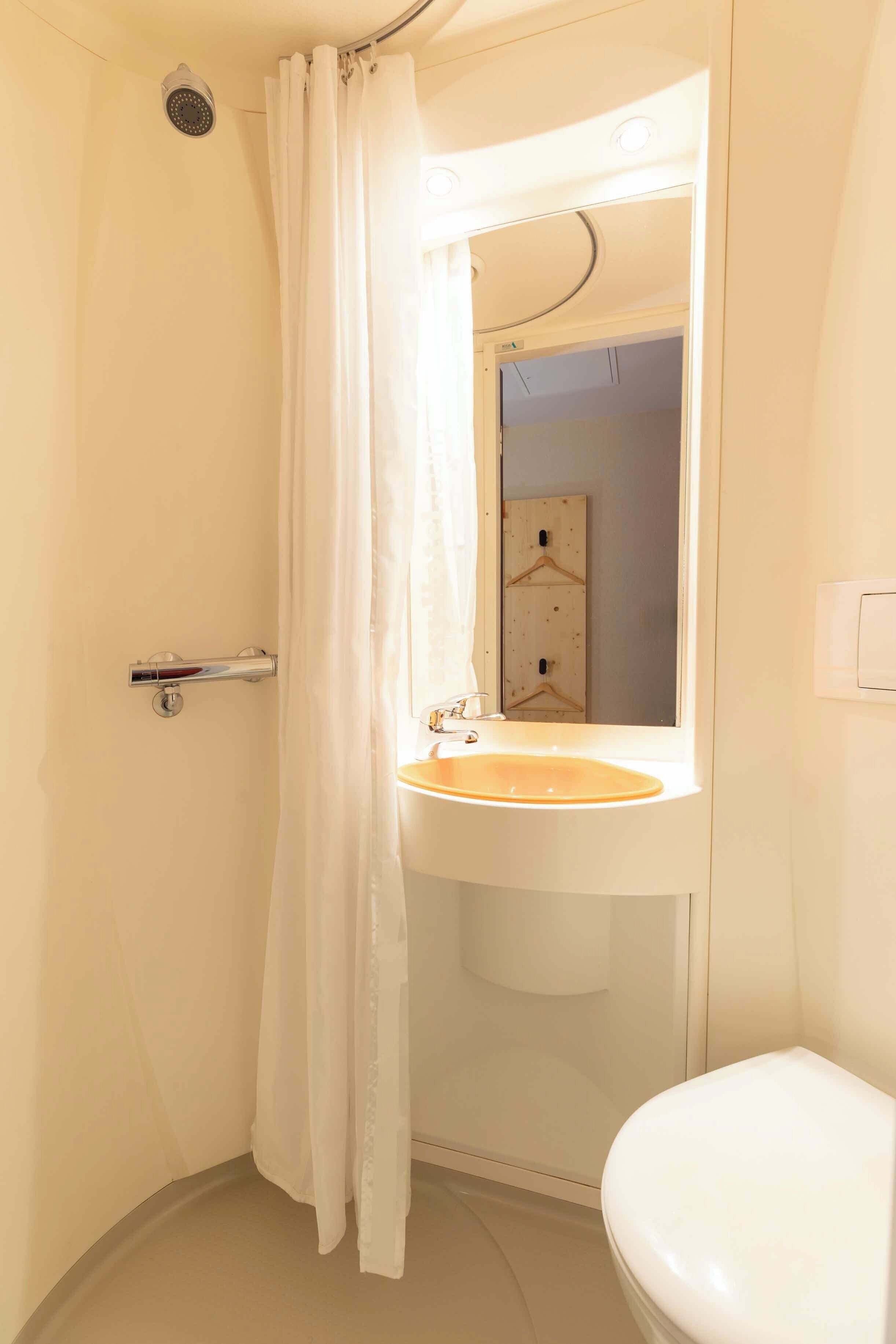 Shower, eco-friendly toiletries, hair dryer, towels