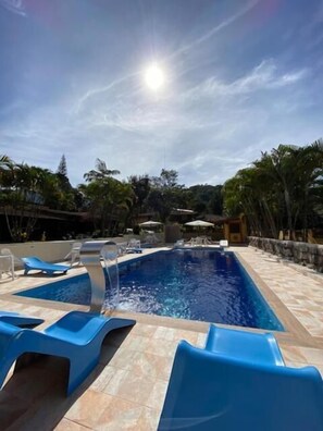 Outdoor pool, pool umbrellas, pool loungers