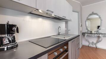 Apartment, 1 Bedroom (Rosa) | Private kitchenette | Fridge, oven, stovetop, coffee/tea maker