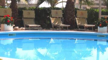 Seasonal outdoor pool, sun loungers