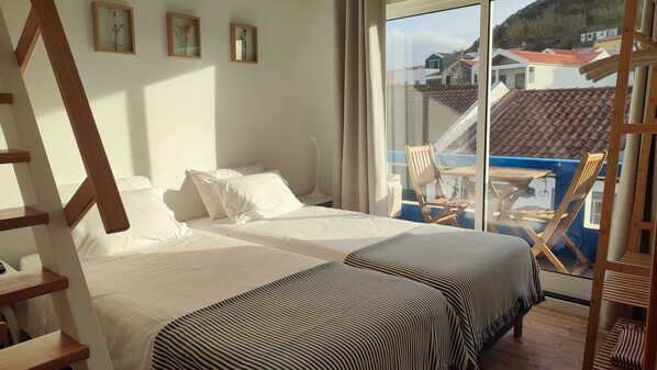 Double or Twin Room, Partial Sea View | Cribs/infant beds, free WiFi, bed sheets