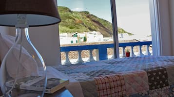 Double or Twin Room, Partial Sea View | Cots/infant beds, free WiFi, bed sheets