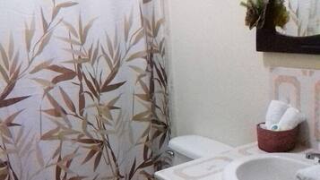 Classic Room, 2 Double Beds, Non Smoking | Bathroom | Shower, free toiletries, towels, soap