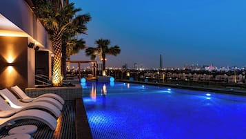 Outdoor pool, free pool cabanas, pool umbrellas