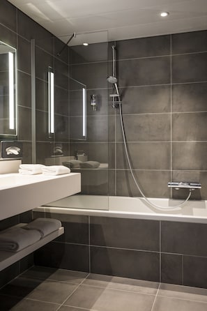 Eco-friendly toiletries, hair dryer, towels
