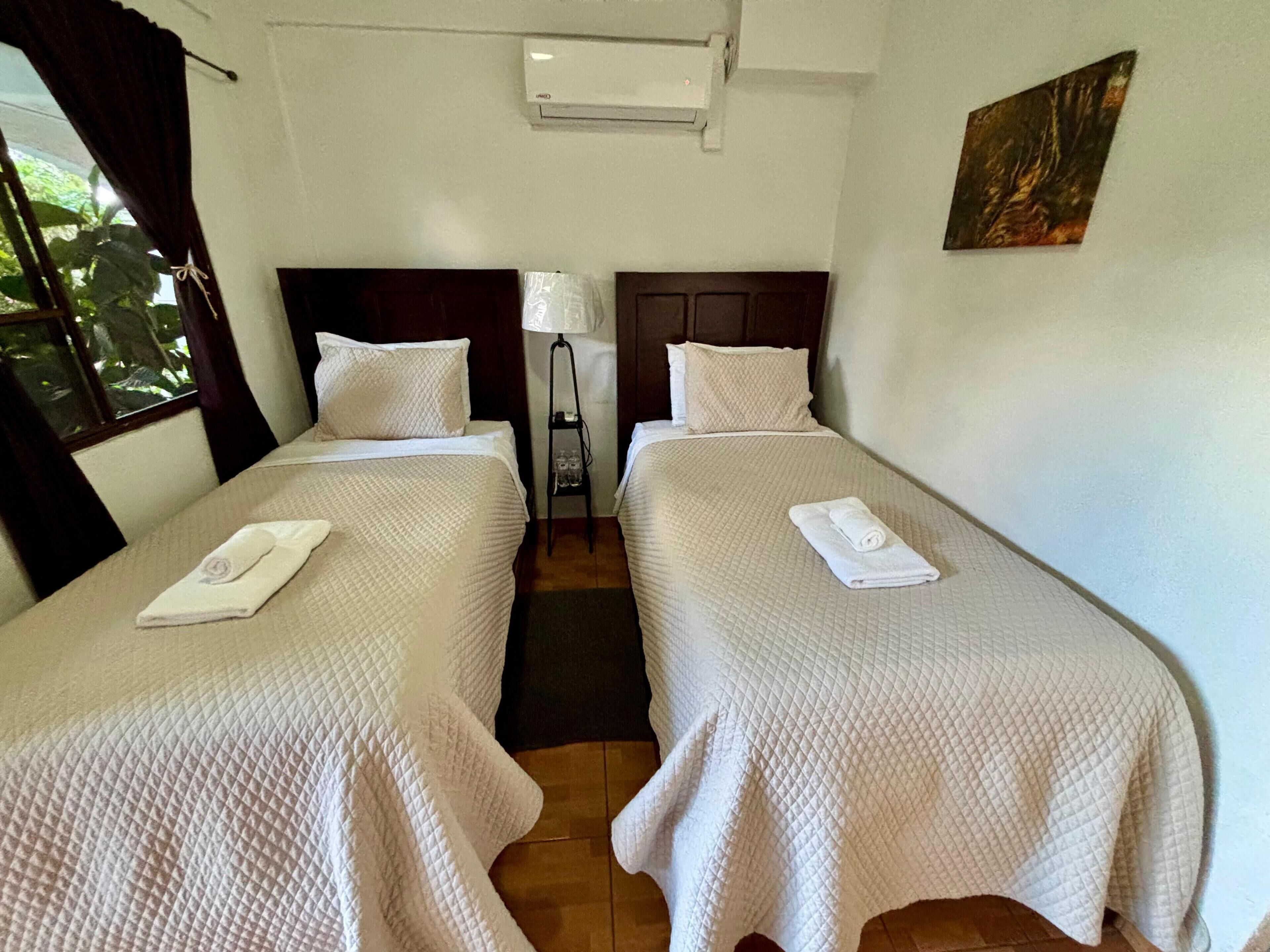 Twin Room, 1 Bedroom, Non Smoking | Down duvets, blackout curtains, free WiFi, bed sheets