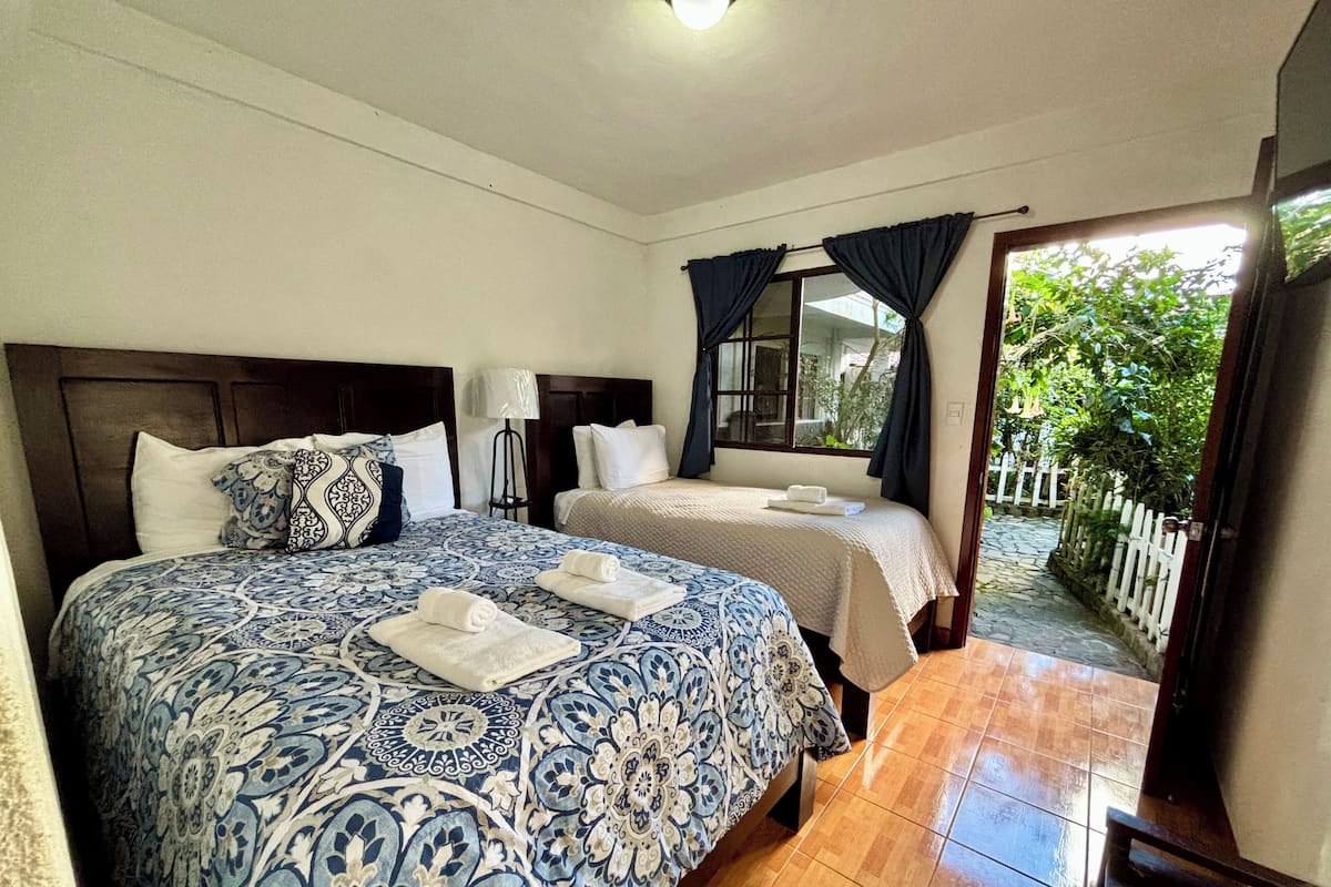 Triple Room, 3 Bedrooms, Non Smoking | Down duvets, blackout curtains, free WiFi, bed sheets