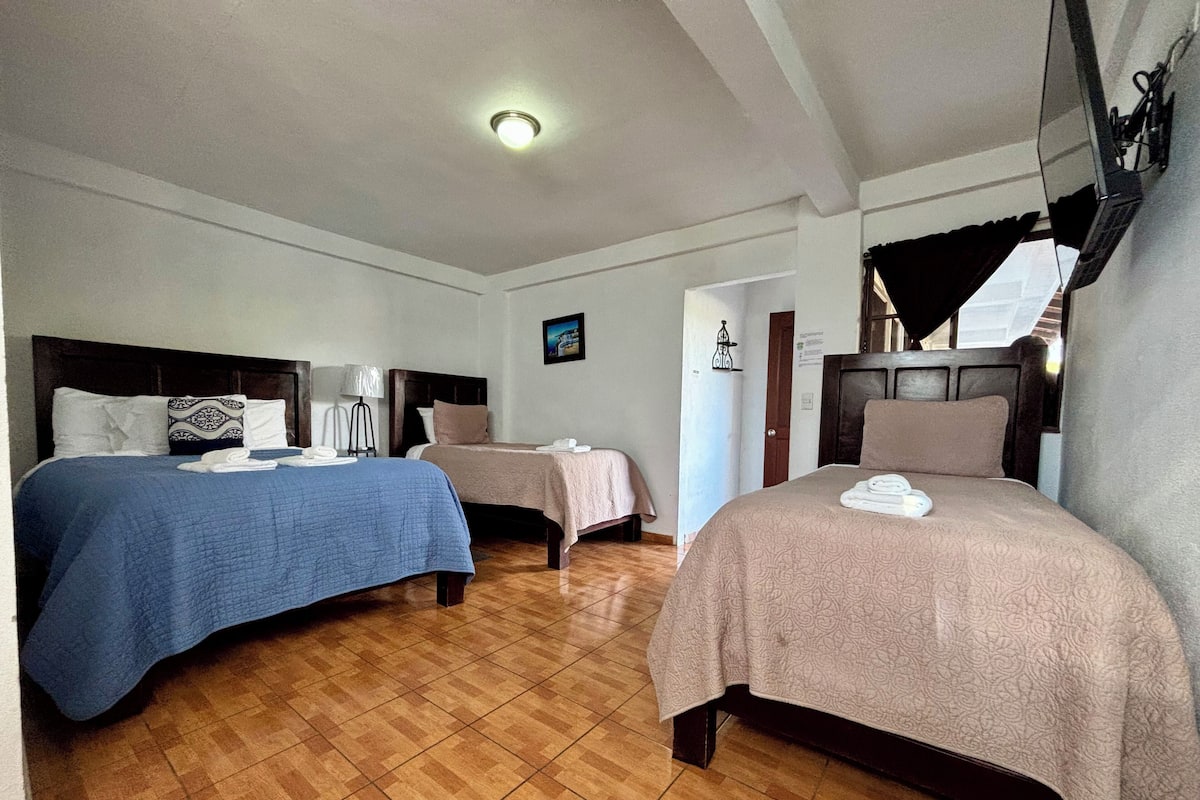 Quadruple Room, 2 Bedrooms, Non Smoking | Down duvets, blackout curtains, free WiFi, bed sheets