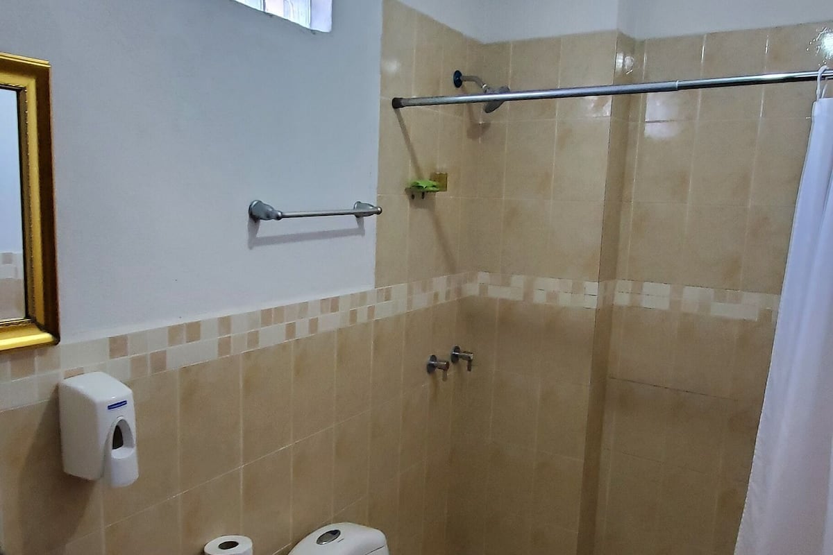 quadruple room, 2 bedrooms, non smoking | bathroom | shower, rainfall showerhead, free toiletries, towels