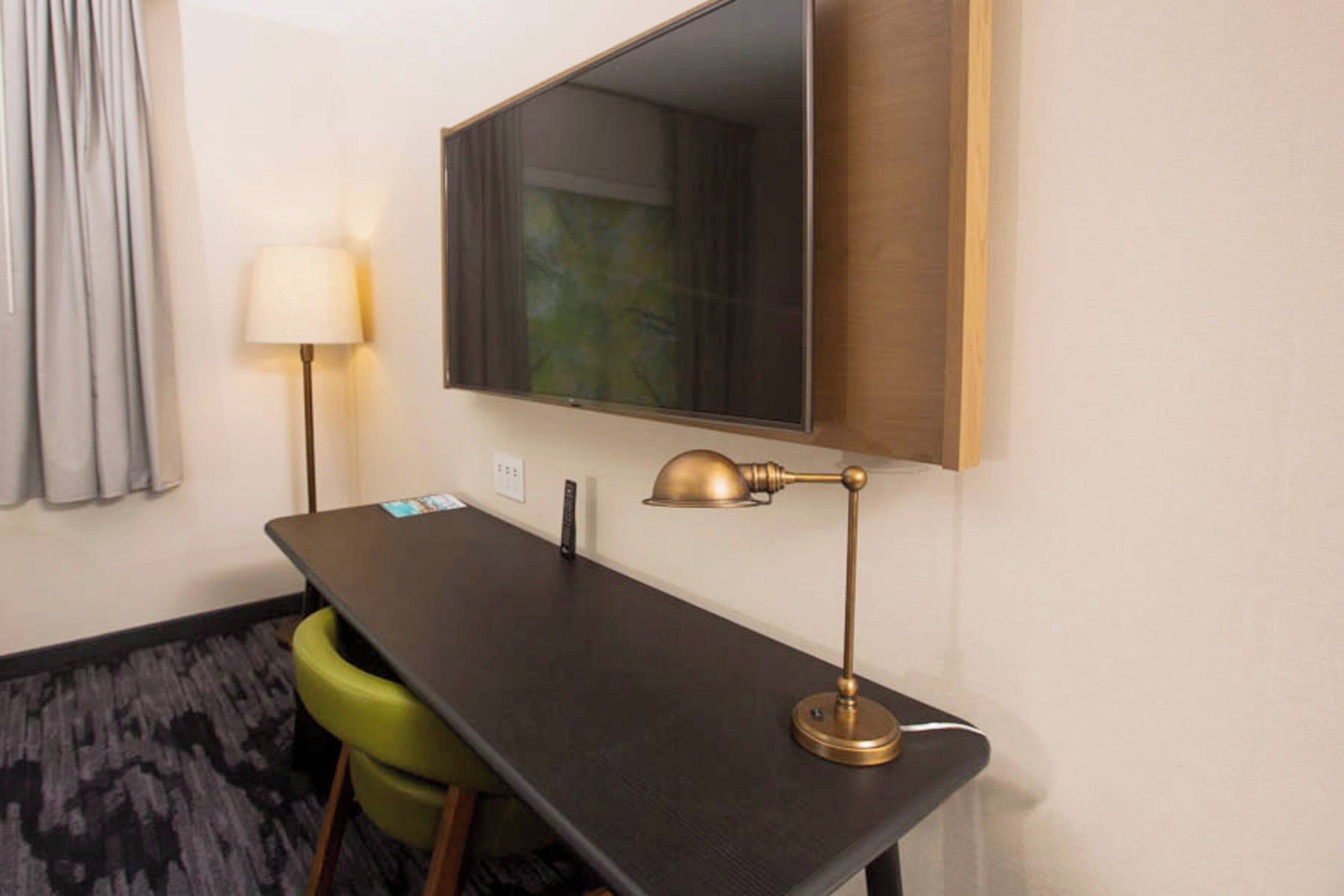 desk, laptop workspace, iron/ironing board, free cots/infant beds