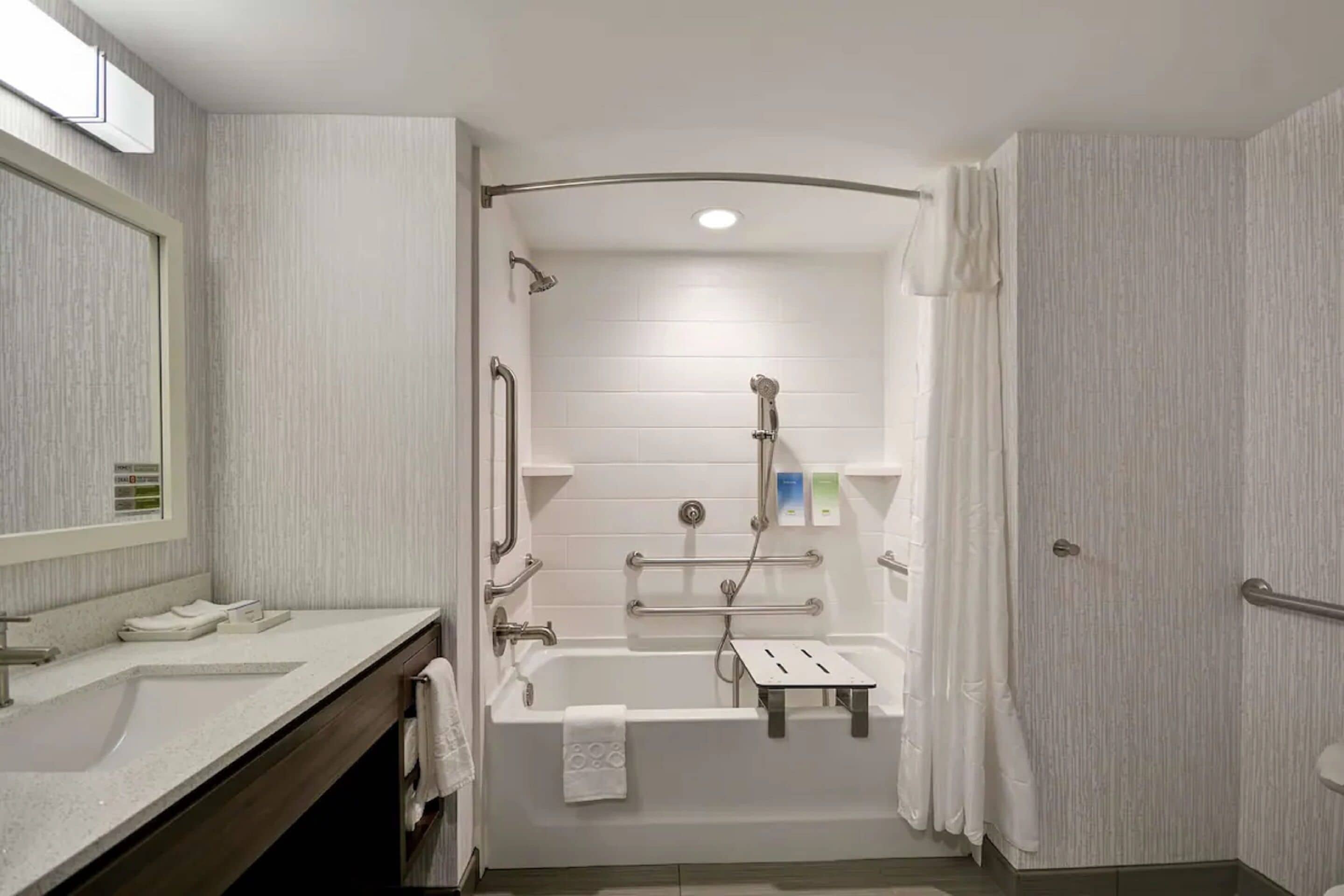 hydromassage showerhead, free toiletries, hair dryer, towels