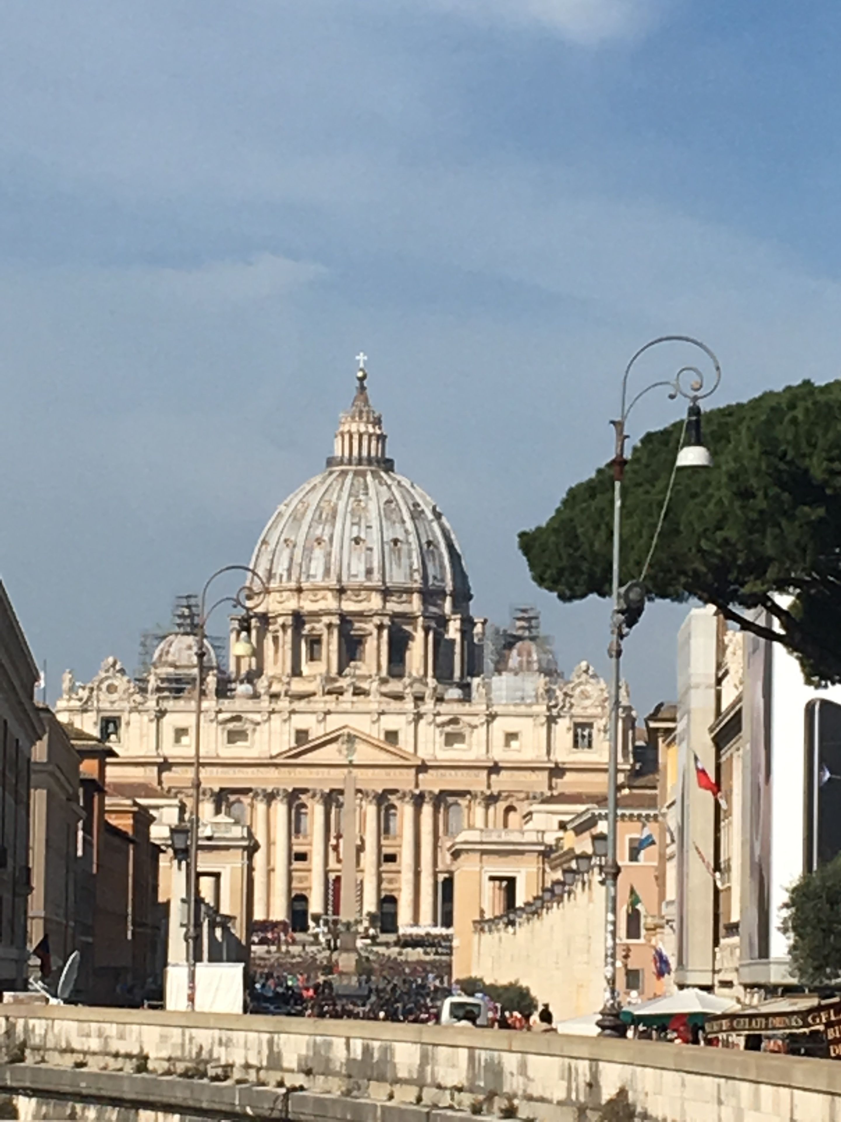 A grand historical building with a large dome and classical architecture.