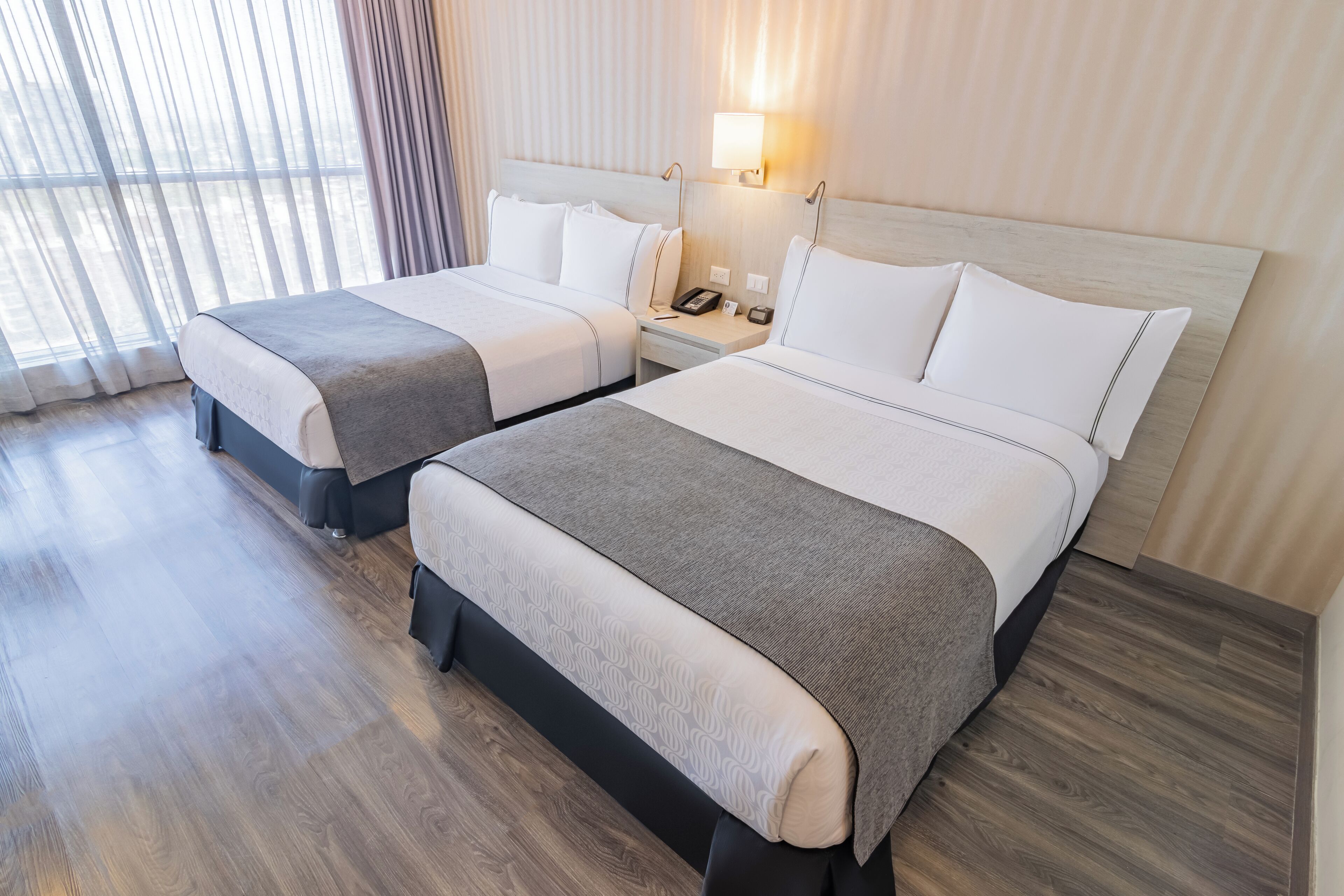 standard room, 2 double beds | 1 bedroom, minibar, in-room safe, blackout curtains