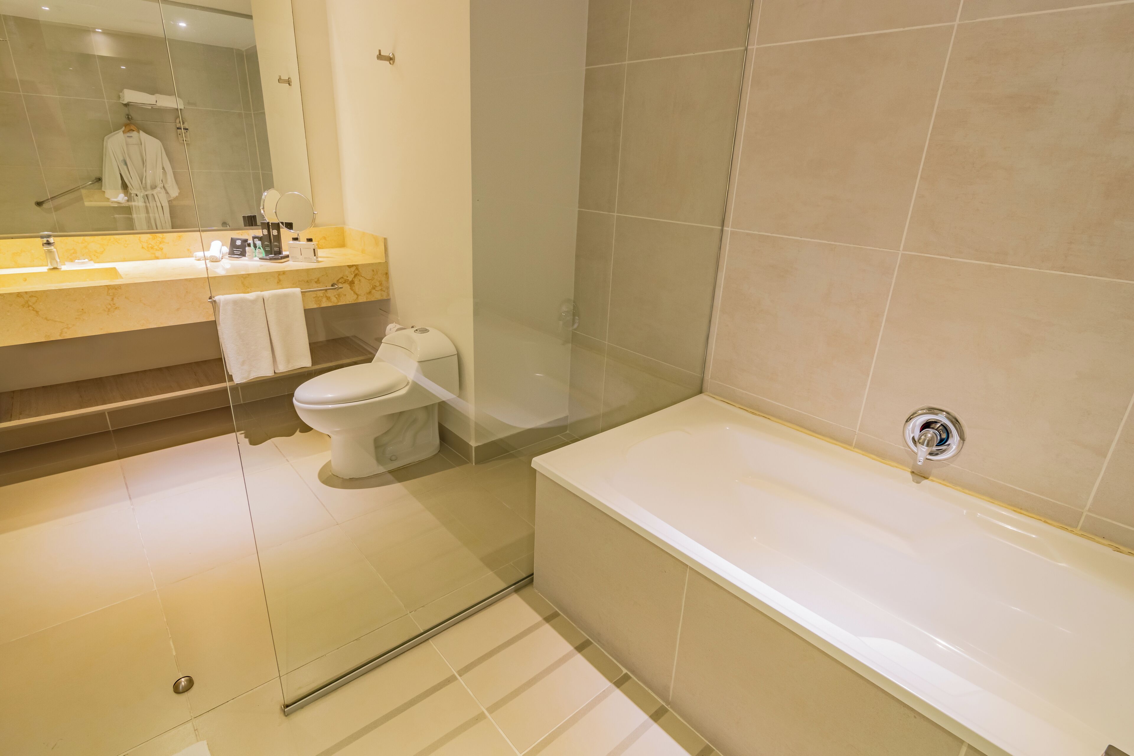 standard room, 2 double beds | bathroom | shower, designer toiletries, hair dryer, towels