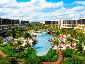 3 outdoor pools, open 8 AM to 8 PM, cabanas (surcharge), pool umbrellas