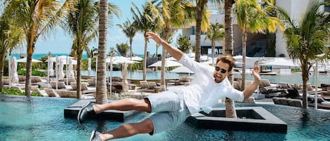 3 outdoor pools, open 8 AM to 8 PM, pool cabanas (surcharge)