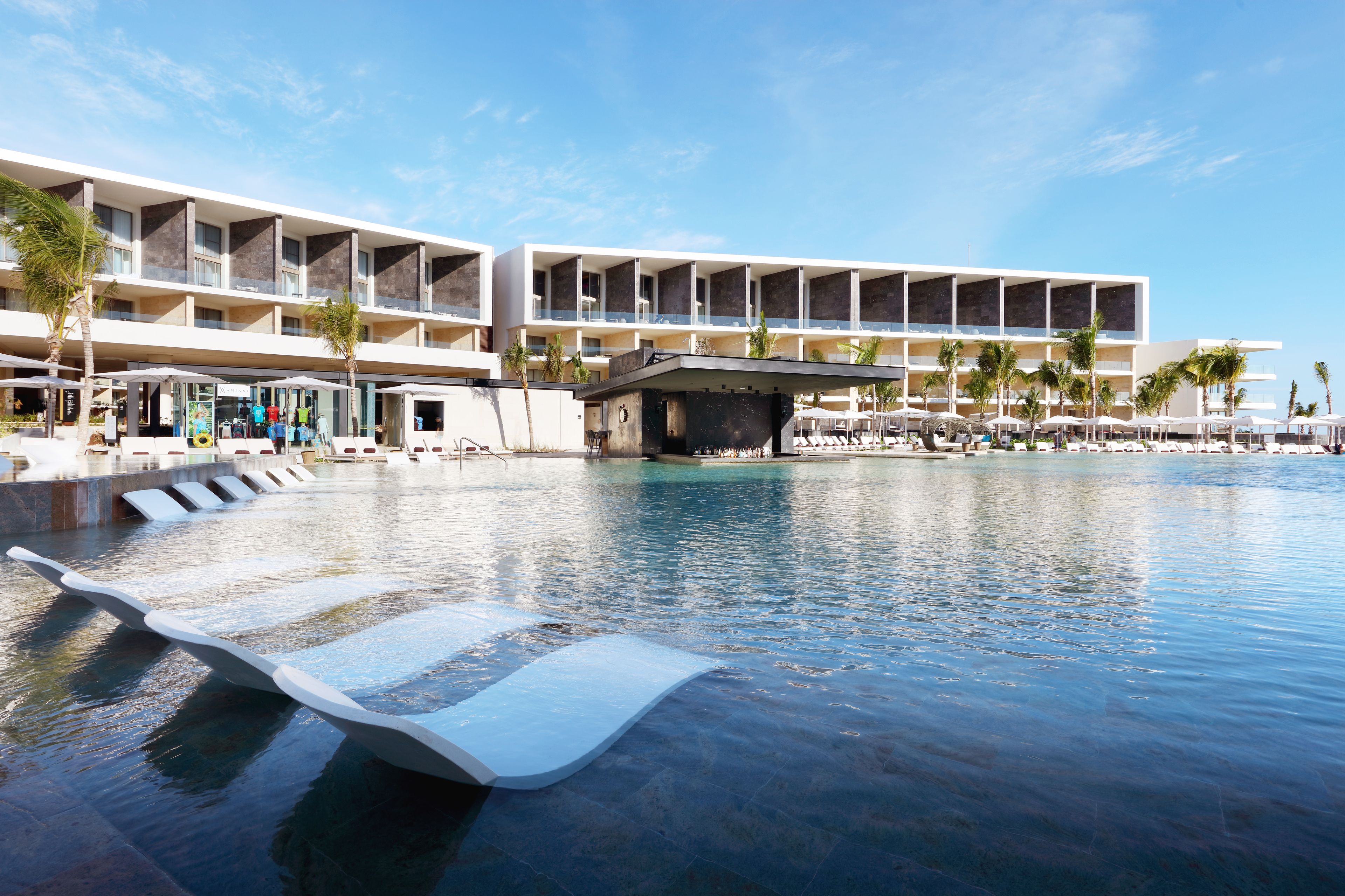 3 outdoor pools, open 8 AM to 8 PM, pool cabanas (surcharge)